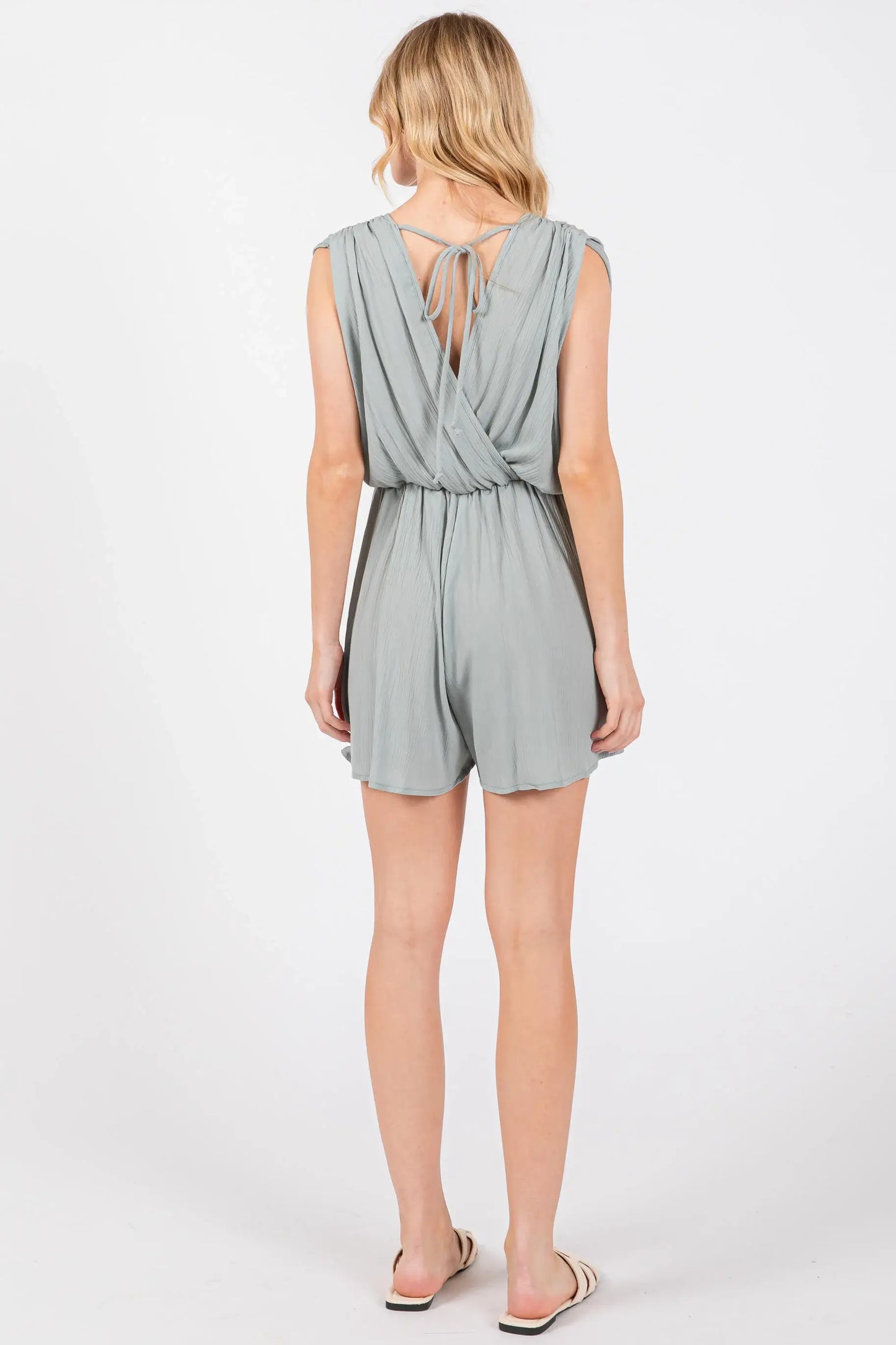 The Esme Solid Deep V-Neck Romper in Black