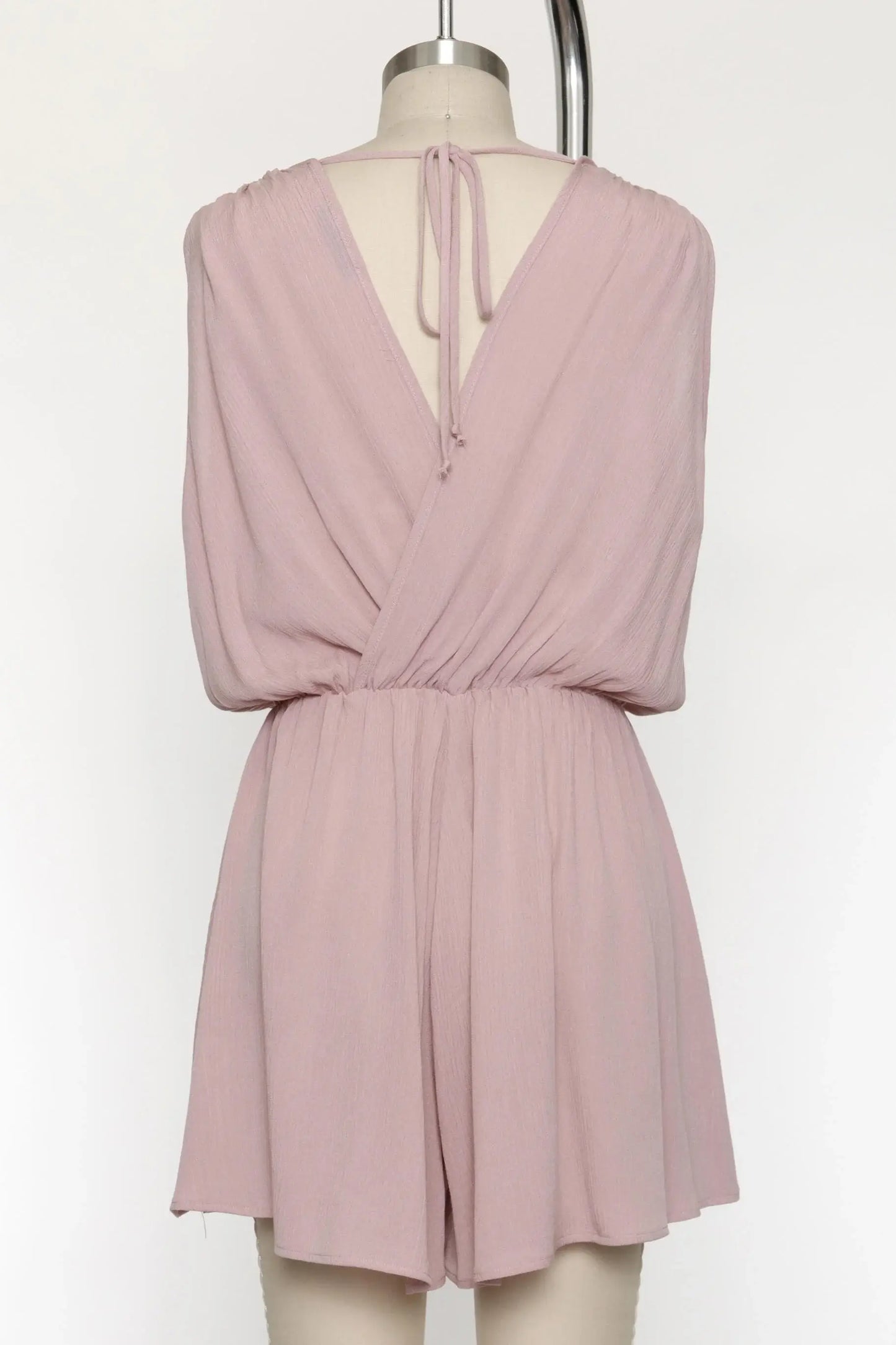 The Esme Solid Deep V-Neck Romper in Black