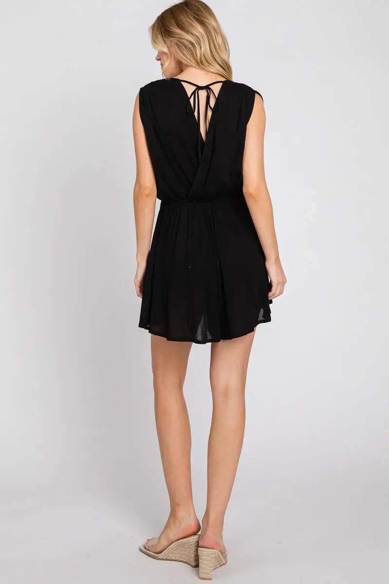 The Esme Solid Deep V-Neck Romper in Black