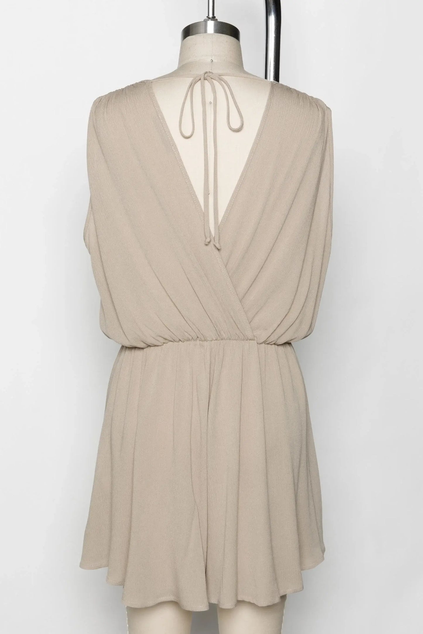 The Esme Solid Deep V-Neck Romper in Black