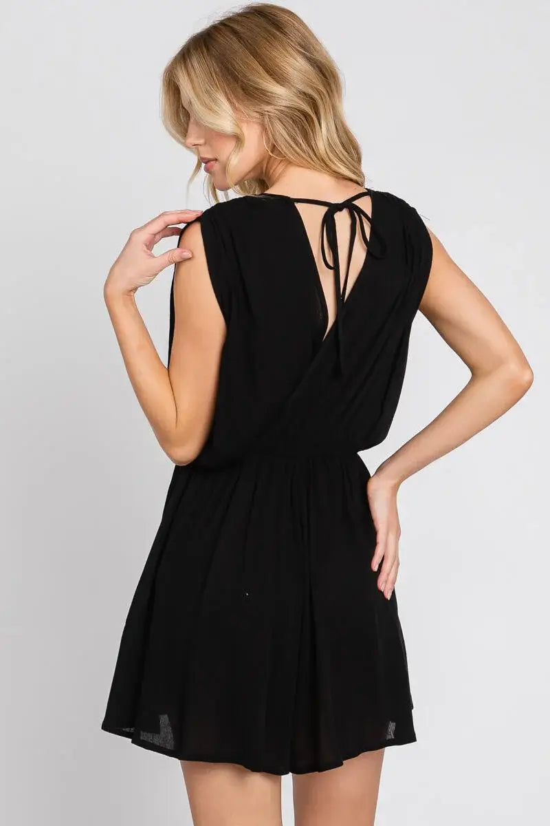The Esme Solid Deep V-Neck Romper in Black