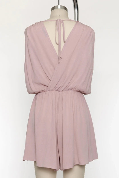 The Esme Solid Deep V-Neck Romper in Black