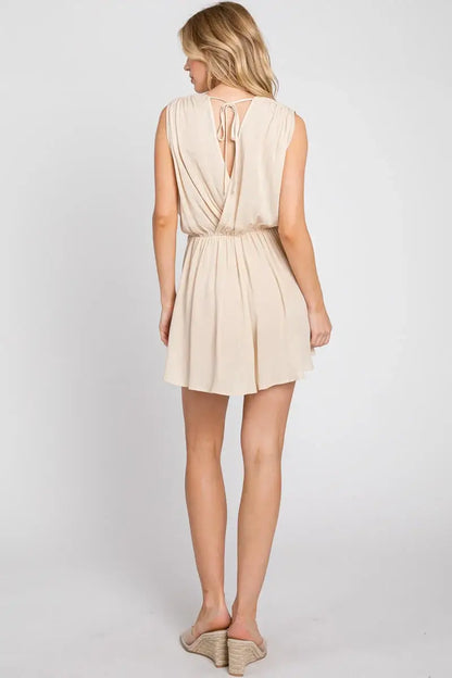 The Esme Solid Deep V-Neck Romper in Black
