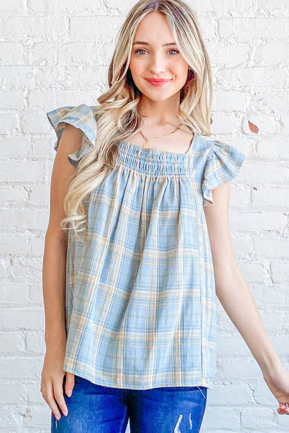 The Faye Ruffle Baby Doll Top in blue