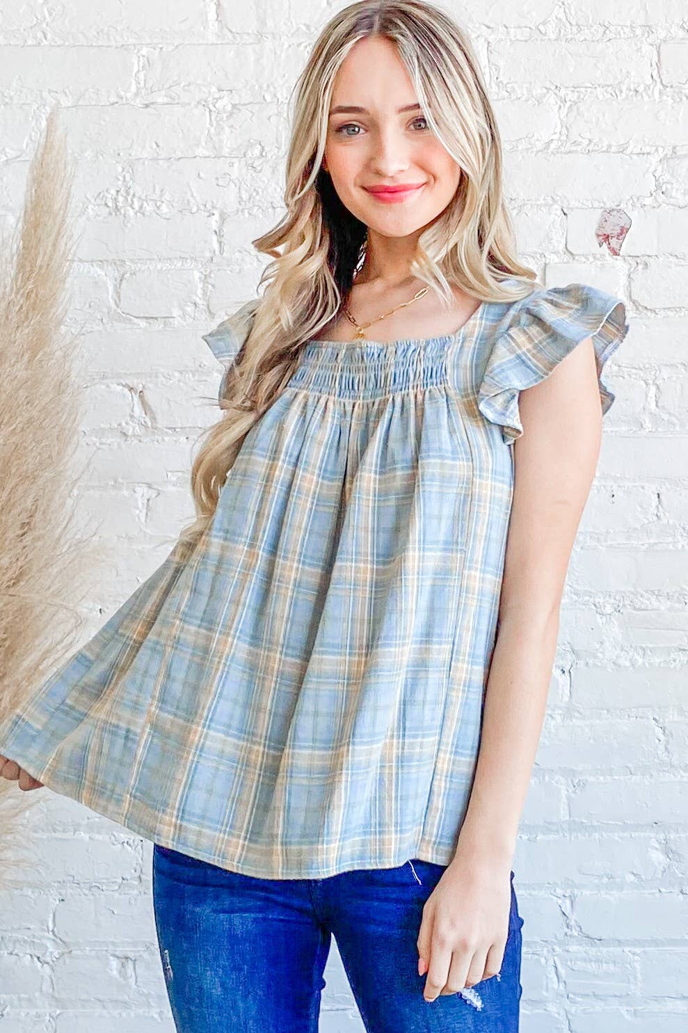 The Faye Ruffle Baby Doll Top in blue