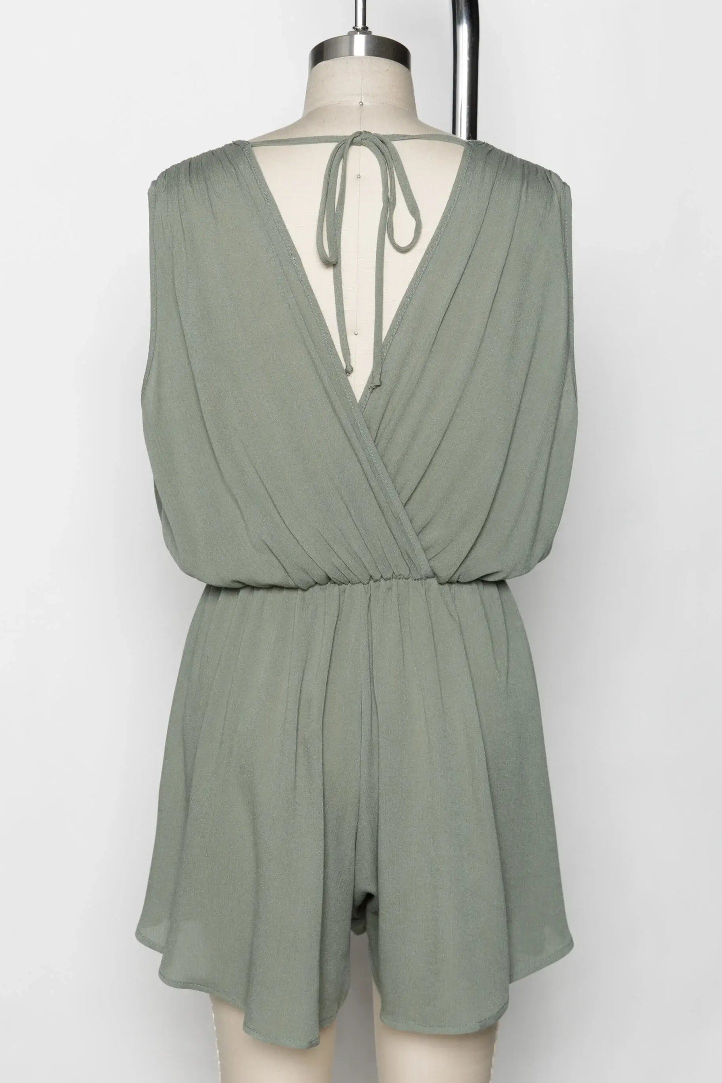 The Esme Solid Deep V-Neck Romper in Black