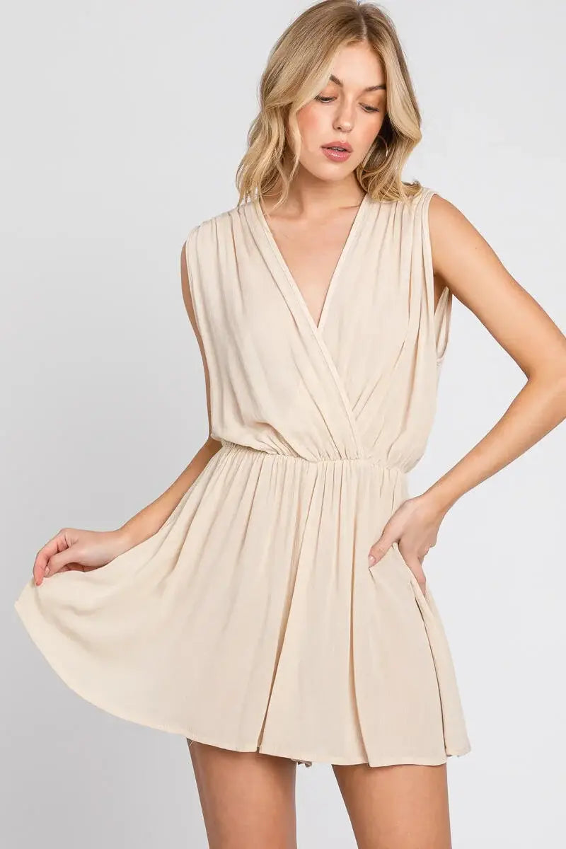 The Esme Solid Deep V-Neck Romper in Black