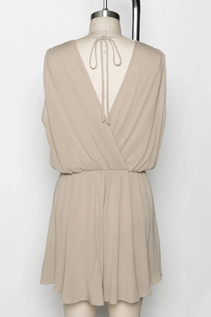 The Esme Solid Deep V-Neck Romper in Black