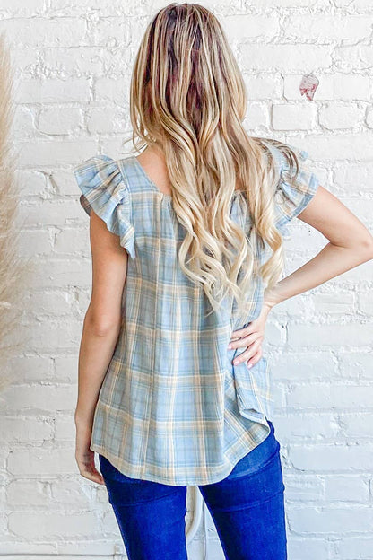 The Faye Ruffle Baby Doll Top in blue