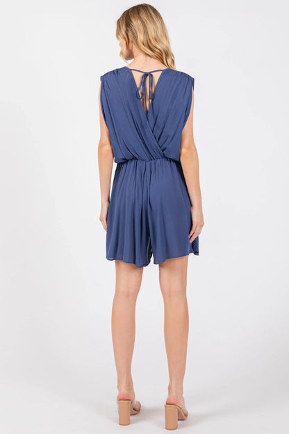 The Esme Solid Deep V-Neck Romper in Black