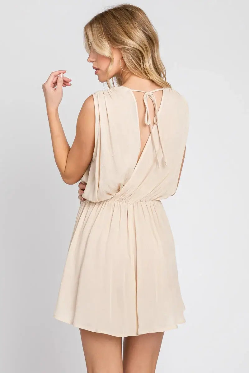 The Esme Solid Deep V-Neck Romper in Black